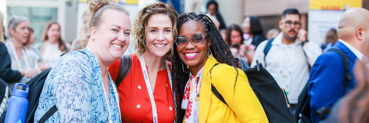 Three women at annual conference